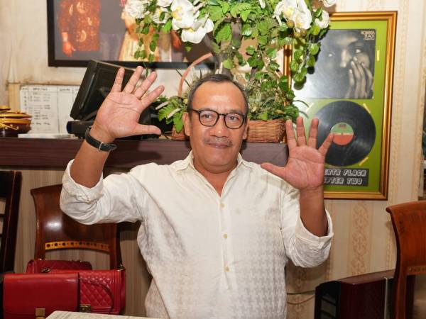 Lonceng di Garasi Kita